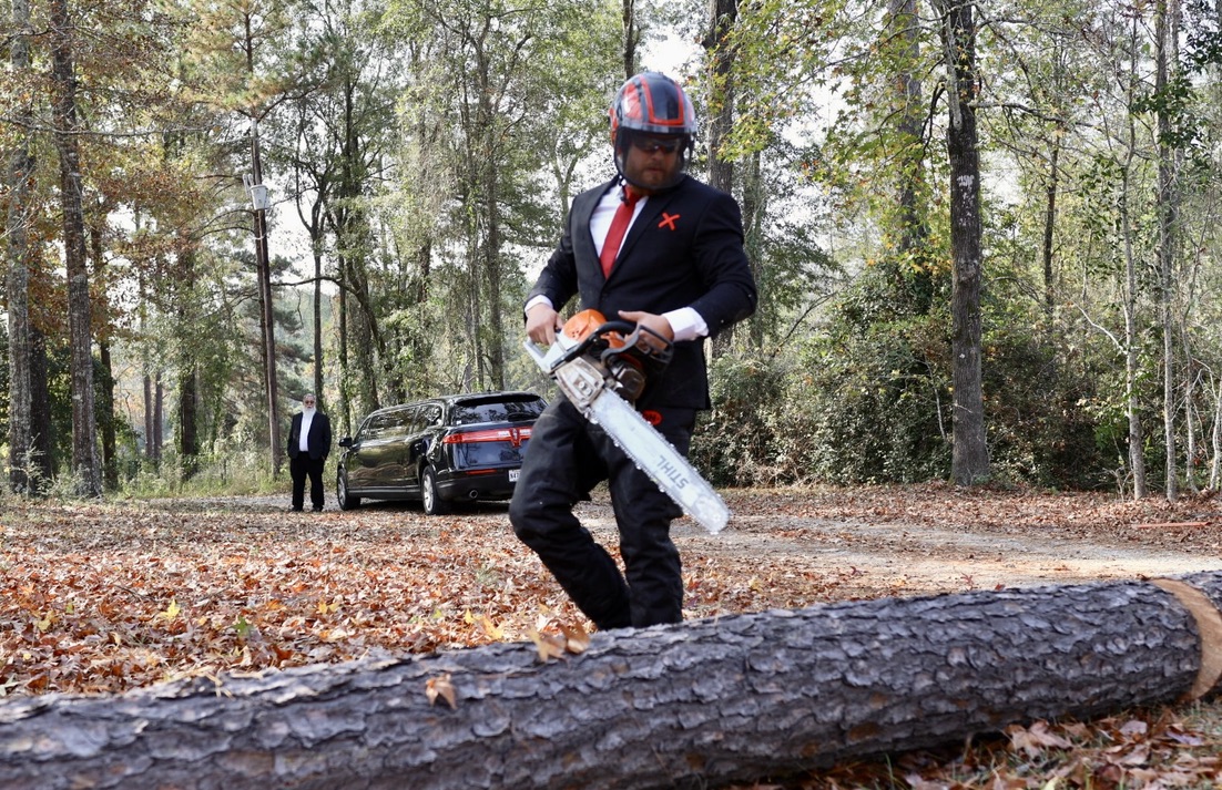 Suits & Saws campaign — chainsaw action